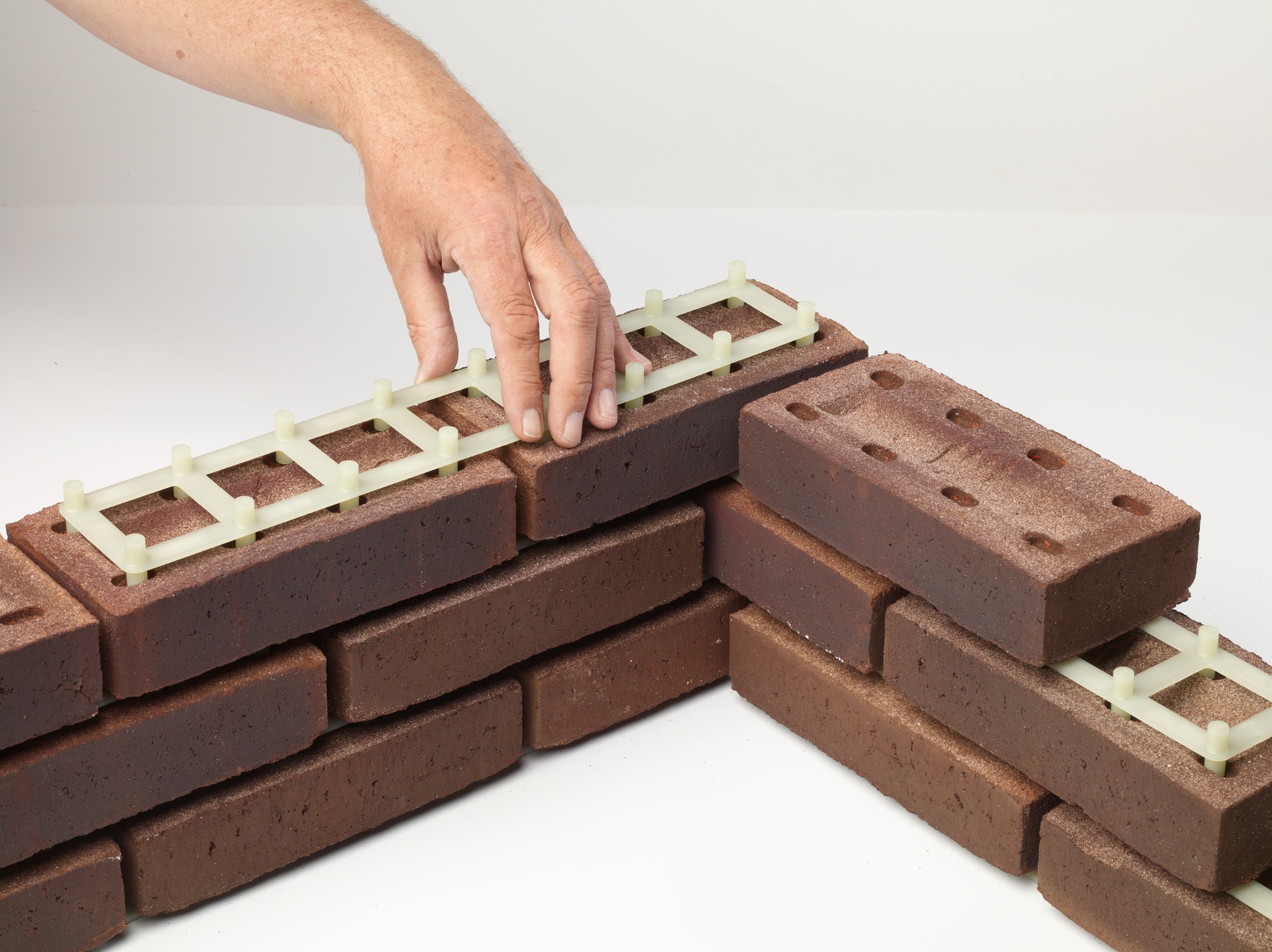Drystack layer met bakstenen
